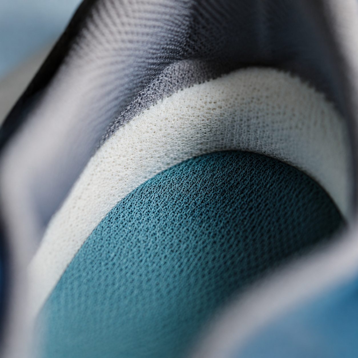 Close-up of the cushioned insole and soft lining inside a child's shoe