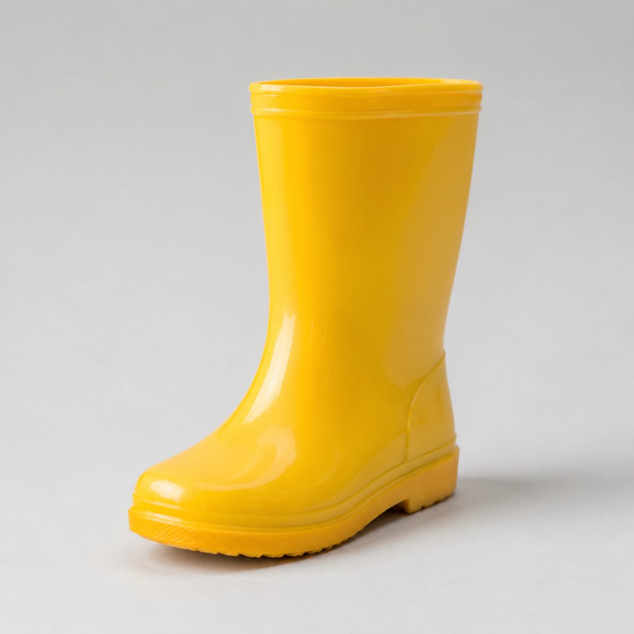 Children's glossy rubber rain boots in a bright solid color