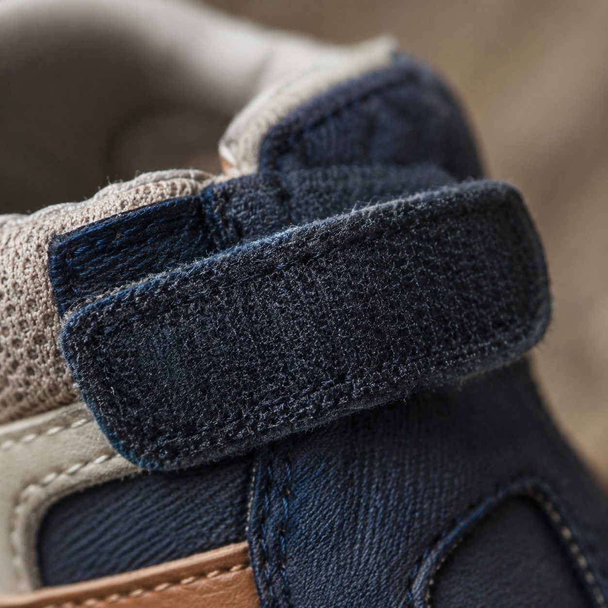 Close-up of a hook-and-loop strap closure on a child's shoe
